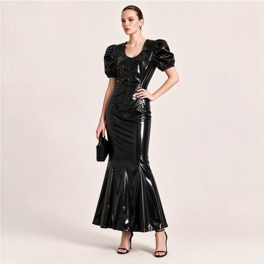 Model wearing black patent faux leather puff-sleeve mermaid maxi dress